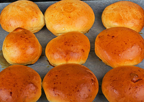 istock bread in baking tin just removed from oven. 517240441
