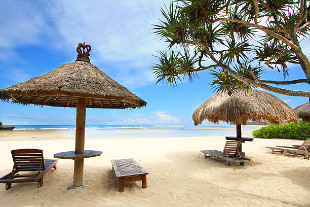 istock Tropical beach with gazebo 517241555