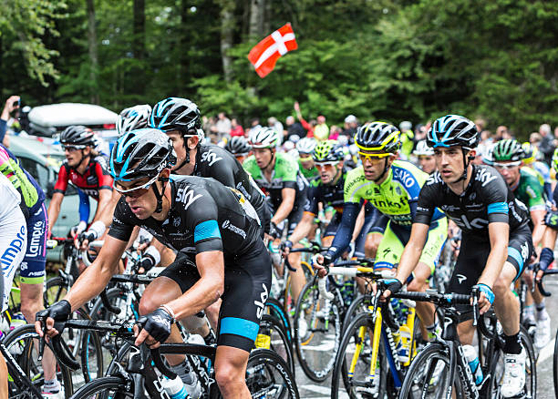 Inside the Peloton Le Markstein, France- July 13, 2014:The Australian cyclist Richie Porte (Team Sky),inside the peloton, climbing the road to mountain pass Le Markstein during the stage 9 of Le Tour de France 2014. tour de france stock pictures, royalty-free photos & images