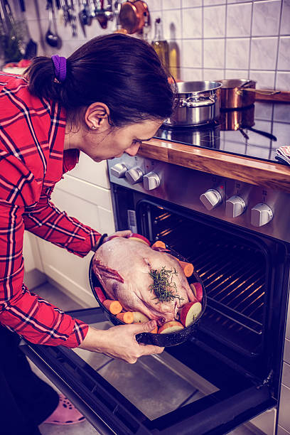 istock Preparing Traditional Holiday Goose with Side Dishes 517250923