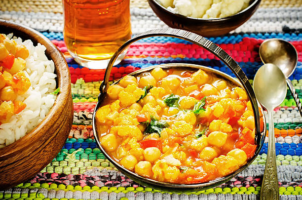 istock curry chickpea with cauliflower and vegetables 517253175