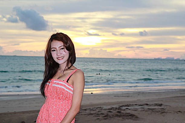 istock Thai girl on the beach 517253383