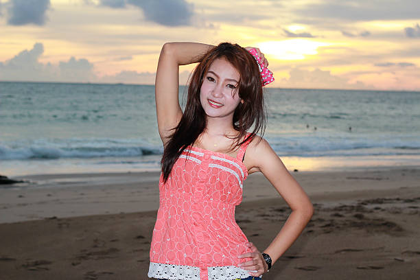 istock Thai girl on the beach 517253385