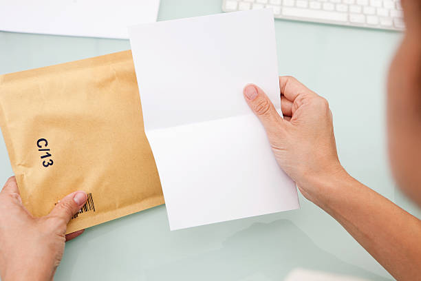 istock Woman reading letter 517253973