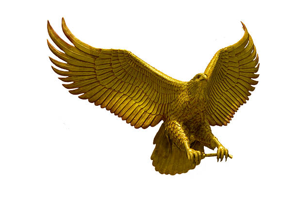 istock Golden eagle statue with big expanded wings 517254195