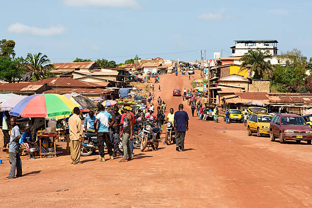 Main street and urban marketplace in Gbarnga in Liberia. stock photo