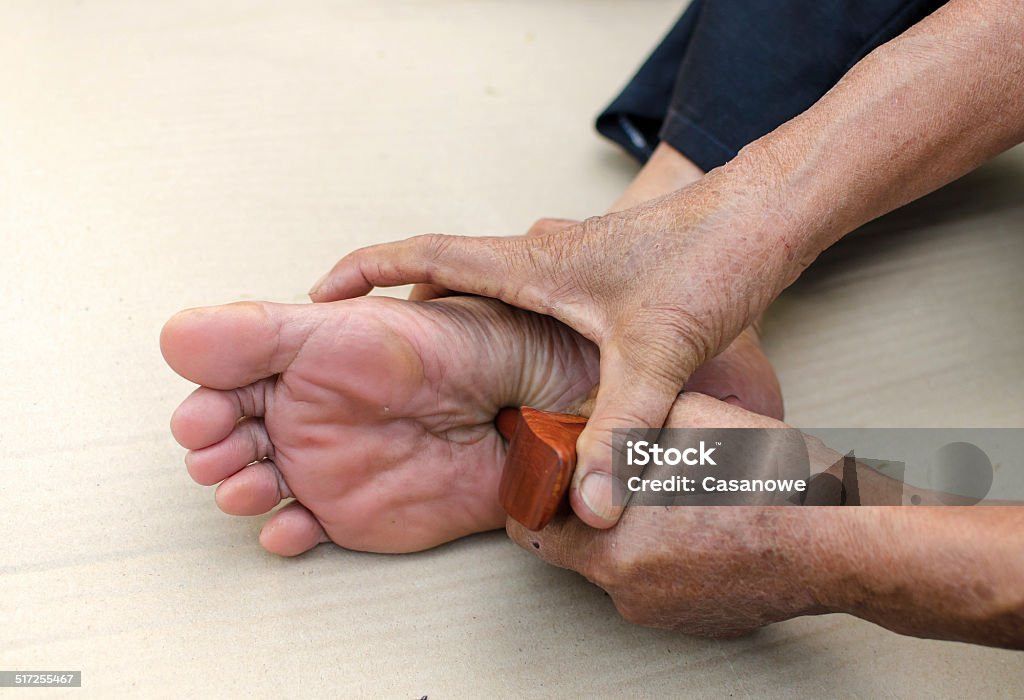 reflexology foot massage, Spa treatment. reflexology foot massage, Spa treatment yourself. Ancient Stock Photo