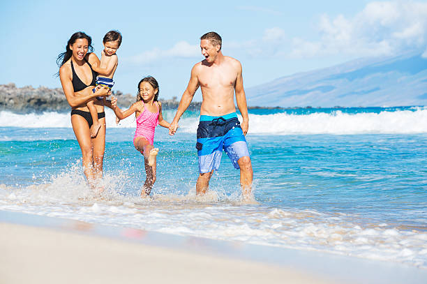 istock Family on the Beach 517262363