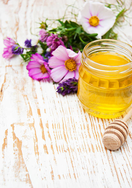 istock Honey with flowers 517262981