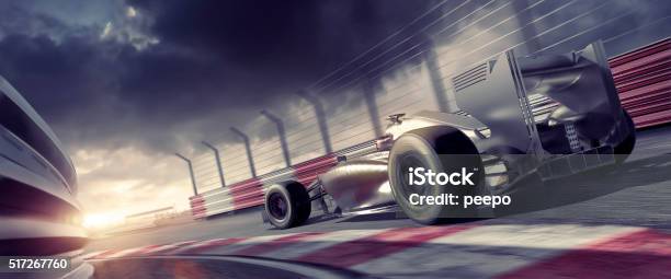 Grand Prix High Speed Racing Car On Racetrack At Sunset Stock Photo - Download Image Now