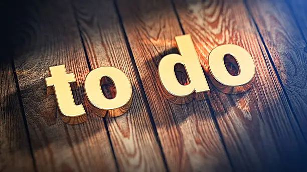 Todolist article. The word "to do" is lined with gold letters on wooden planks. 3D illustration image