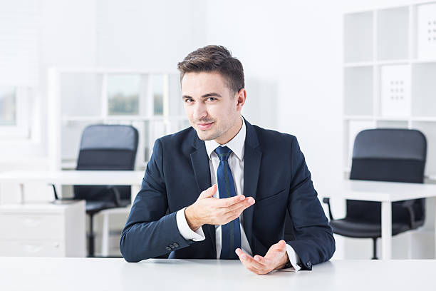 istock Young businessman opposite to his boss 517268006