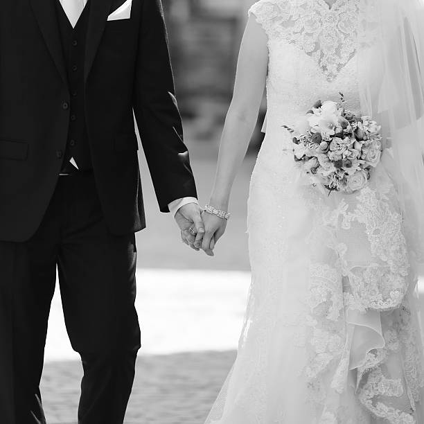 istock Wedding couple walking street 517268431