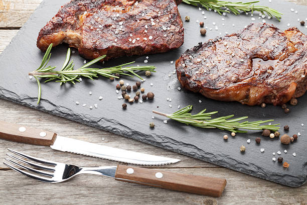 istock Beef steaks with rosemary and spices 517268659