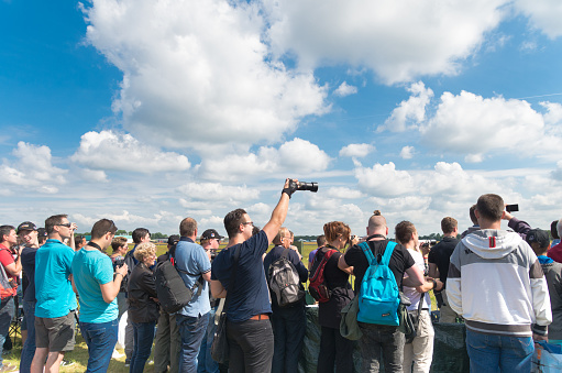 Gilze-Rijen, Netherlands - June 21, 2014: Unknown visitors of the dutch royal air force show 2014. The airbase was in 2 days visited by 245,000 visitors.