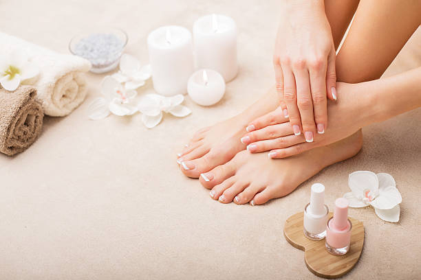 French manicure and pedicure French manicure and pedicure foot spa treatment stock pictures, royalty-free photos & images