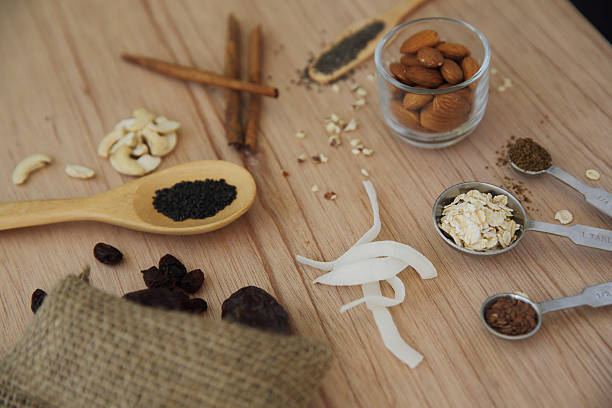 istock nuts almond on wood background 517271256