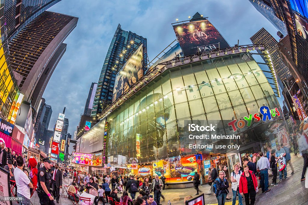 people visit Times Square, featured with Broadway Theaters New York, USA - October 22, 2015:  people visit Times Square, featured with Broadway Theaters and huge number of LED signs, is a symbol of New York City and the United States. Advertisement Stock Photo