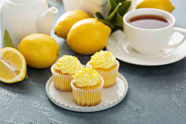 istock Lemon cupcakes with bright yellow frosting 517272870