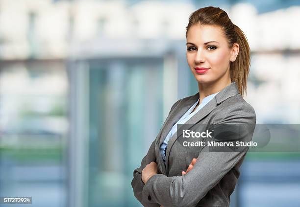 Young Beautiful Businesswoman Portrait Stock Photo - Download Image Now - Adult, Adults Only, Arms Crossed