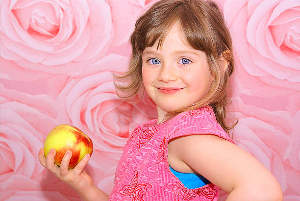 Child's great apple. stock photo