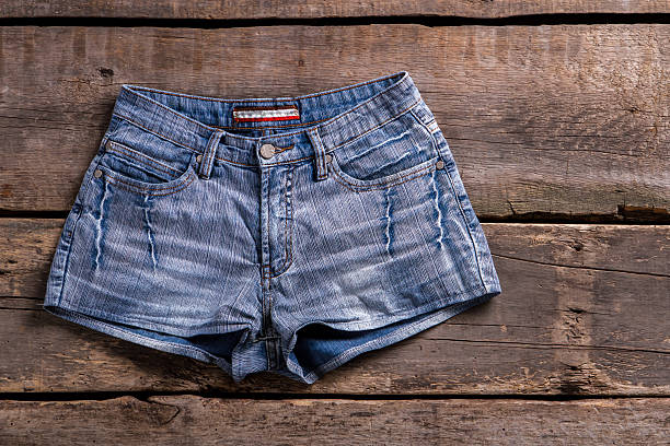 istock Denim shorts on vintage shelf. 517275968