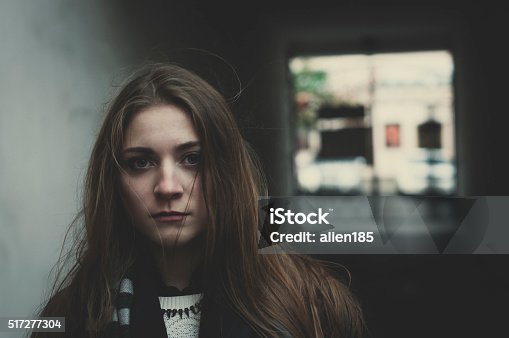 istock Young scared girl 517277304