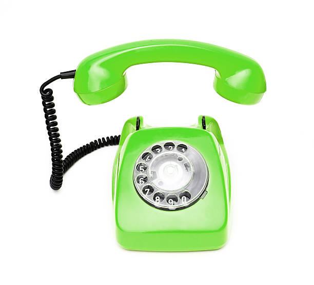 istock Green retro telephone isolated on white background. 517277396