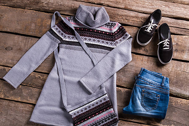 istock Gray tunic with blue jeans. 517277558