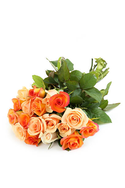 istock Bouquet of orange roses isolated on white 517278944