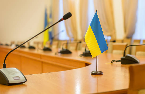 istock Flag of Ukraine on the negotiating table 517280355