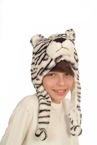 istock Teenage boy with winter hat on a white background 517280522