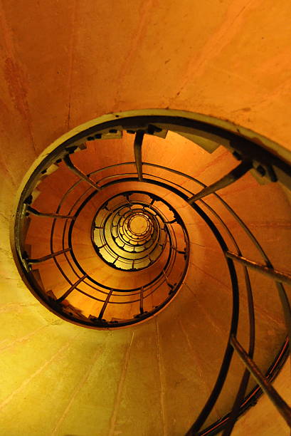 istock Spiral staircase in the stairwell 517281617