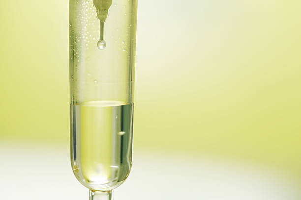 drop of saline solution drop of saline solution saline drip stock pictures, royalty-free photos & images