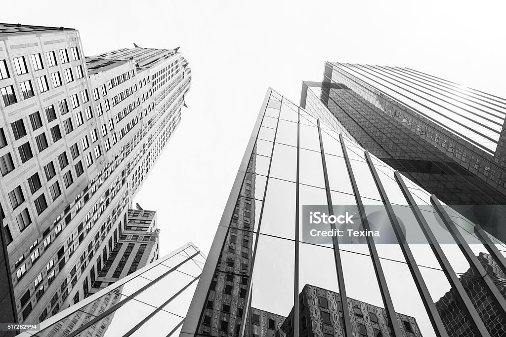 New York skysrapers in perspective from below A view from above of some New York buildings. Black And White Stock Photo