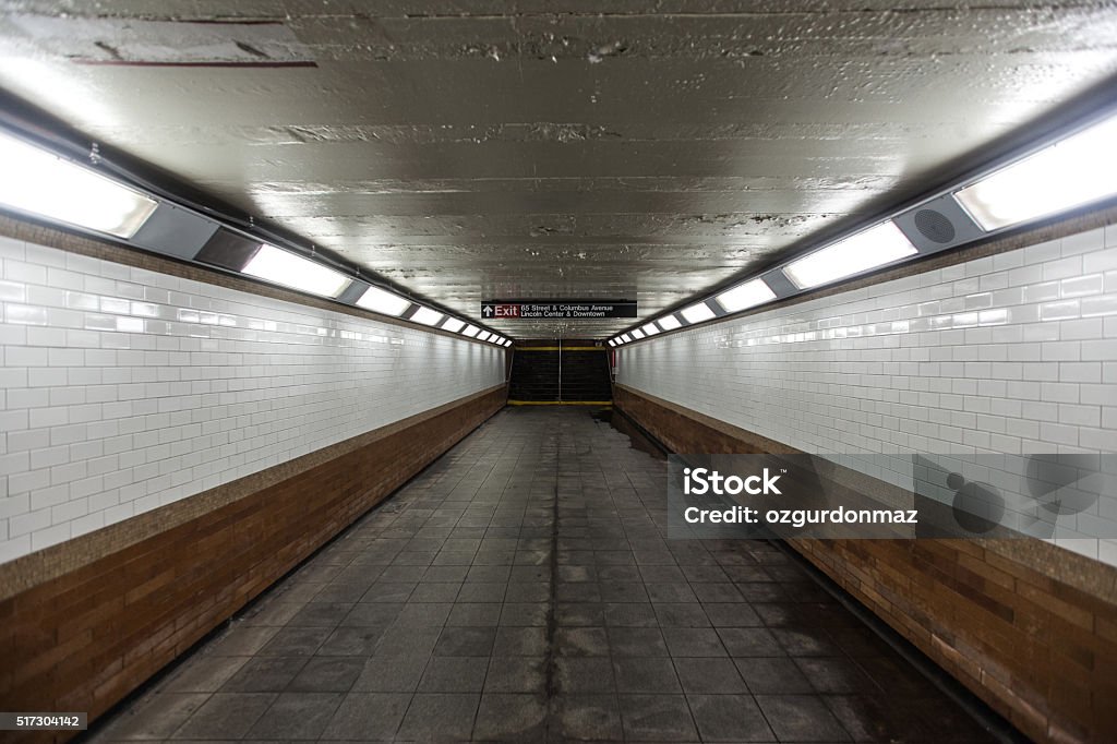 Tunnel in New York subway station Illuminated subway tunnel in New York, USA New York City Stock Photo