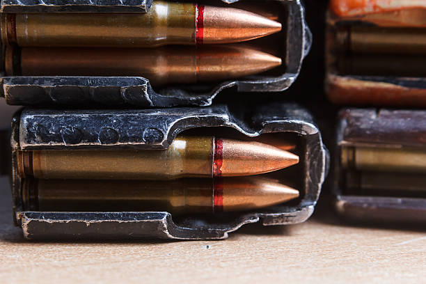 istock ammo for machine guns with loaded magazines 517305052
