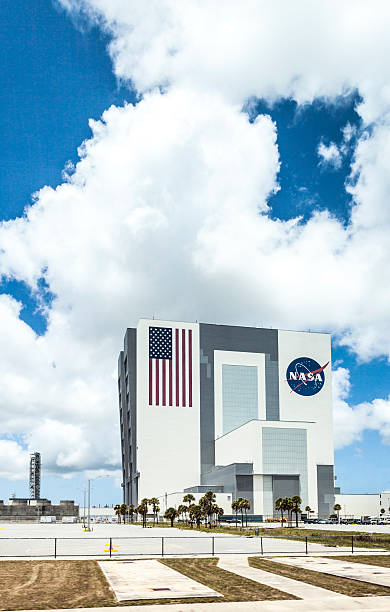 Cape Canaveral, FL, USA - April 1, 2015: NASA Logo and Atlantis Space Shuttle at Kennedy Space Center Visitor Complex in Cape Canaveral, Florida, USA.