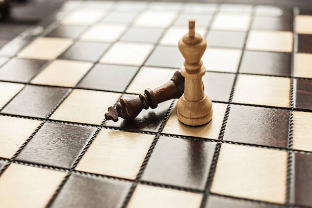 istock chess on the wooden rustic background 517306714