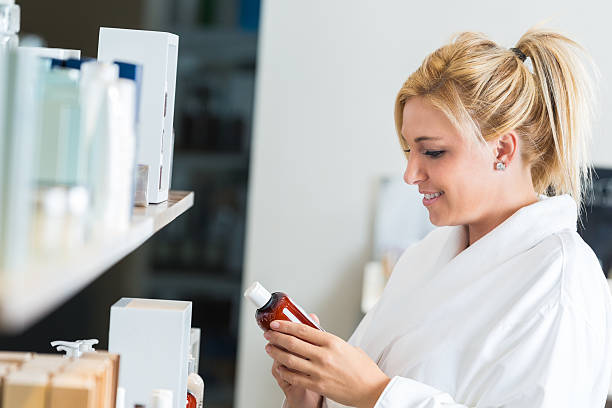 istock Customer in upscale spa purchasing organic beauty products 517308167