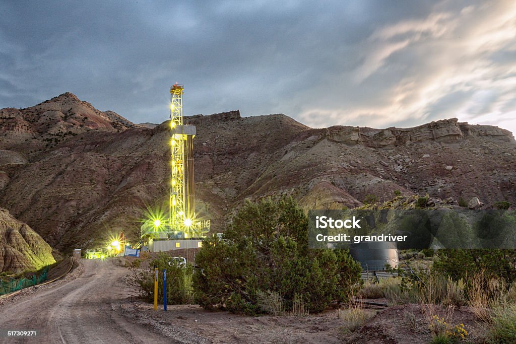 Fracking Drill Rig Fracking Drill Rig in mountains Blue Stock Photo