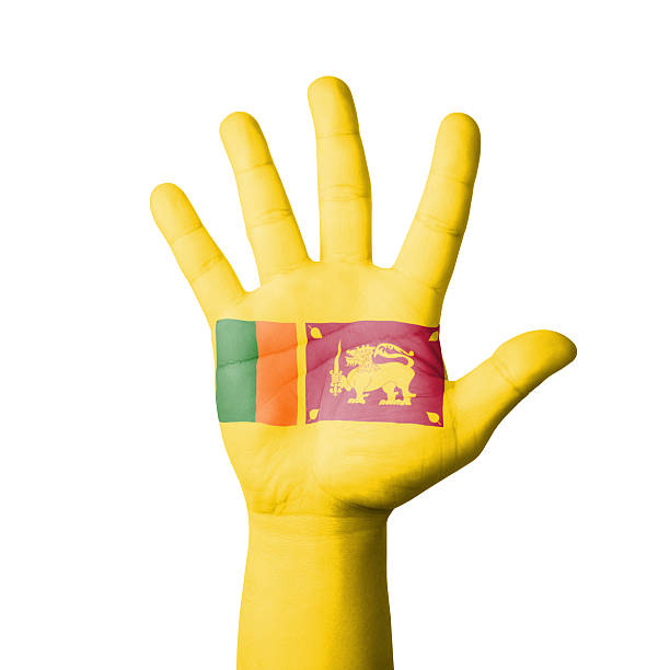 Open hand raised, Sri Lanka flag painted