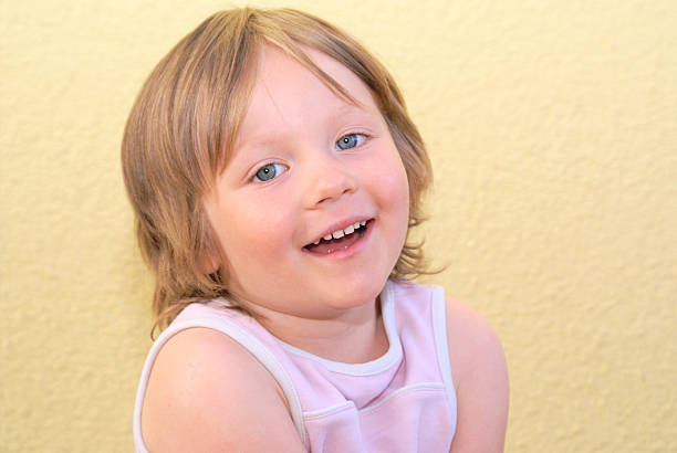 Child  laughs merrily stock photo