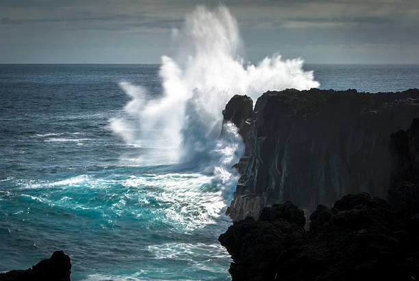 istock Rough see and black rocks 517310435
