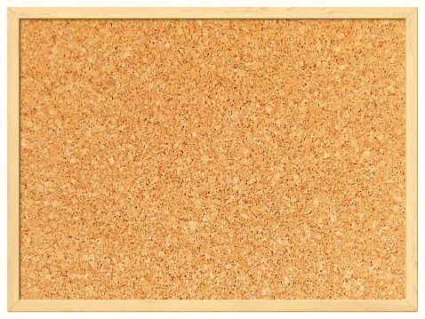 Cork board with wooden frame isolated on white background.