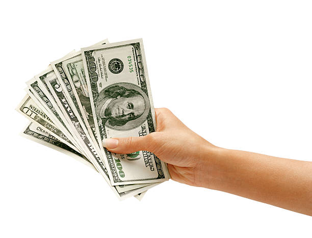 istock Hand is giving money 517311074