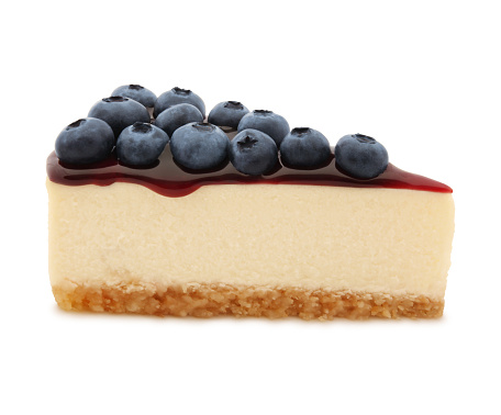 Blueberry Cheesecake Slice and coulis isolated on white (excluding the shadow)