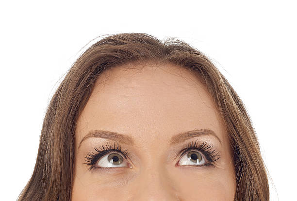 istock Young woman looking up 517312972