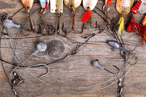 istock fishing tackles and spoon on wooden 517314128