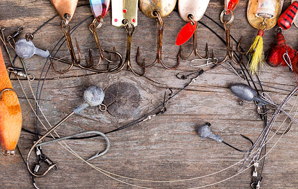 istock fishing tackles and spoon on wooden 517314218